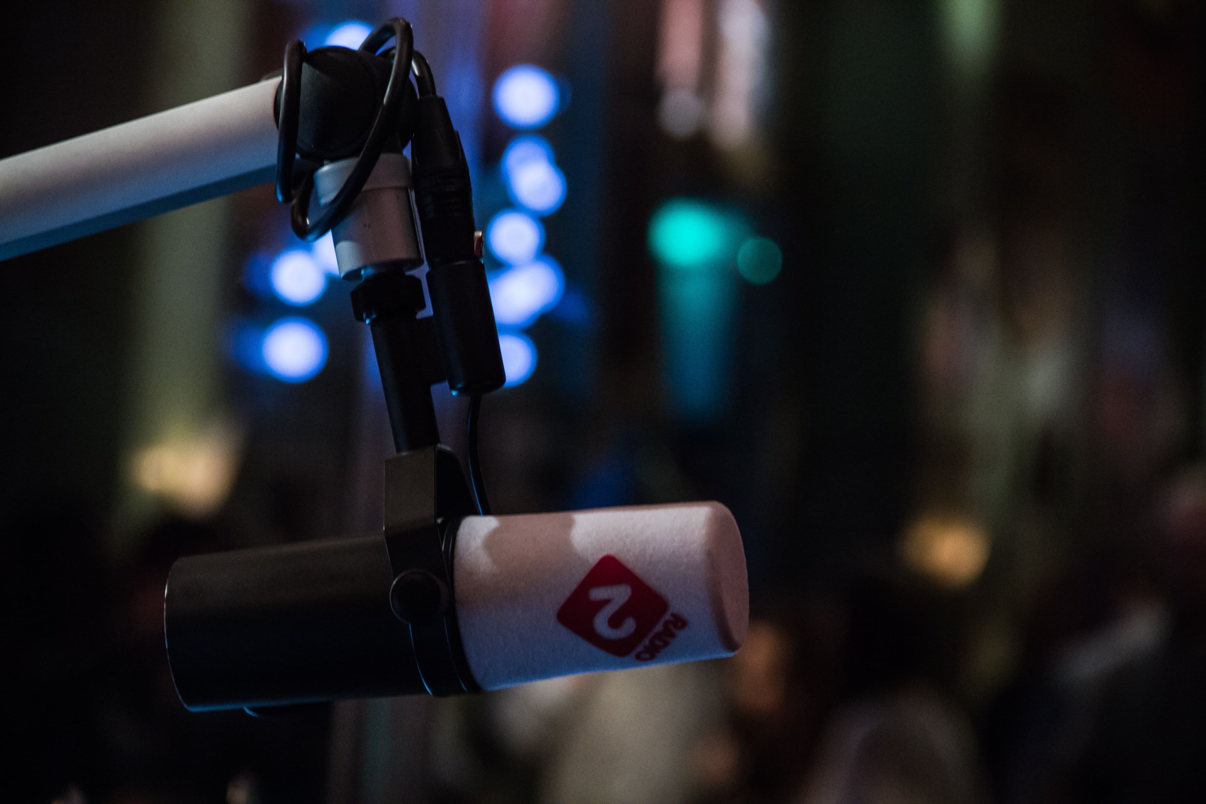 Radio broadcast microphone on a boom arm